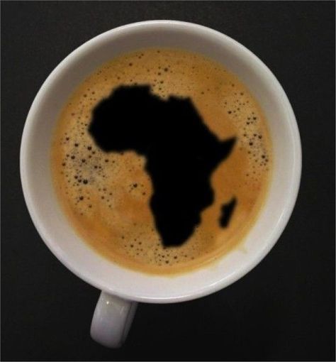 overhead shot of a cup of coffee with a map of Africa